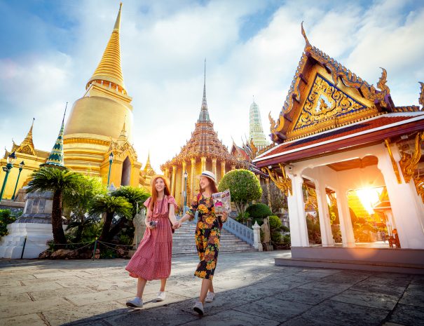 Asian girl walk in Wat phra kaew and grand palace travel in Bangkok city, Thailand; Shutterstock ID 1517075027; purchase_order: -; job: -; client: -; other: -