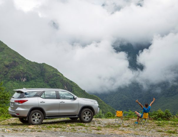 Lao Cai, Viet Nam: Jun 17, 2018: Toyota Fortuner car is on the mouantain road (O Quy Ho pass) in test drive, Vietnam.; Shutterstock ID 1157384845; purchase_order: -; job: -; client: -; other: -