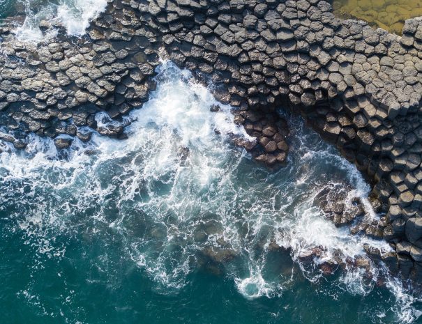 Vietnam natural landscape. Stock image of Ganh Da Dia reef in Phu Yen, Vietnam with special stones, rock make great terrain. Amazing of cliff stone Ganh Da Dia sea with amazing basalt causeway shape; Shutterstock ID 1268165431; purchase_order: -; job: -; client: -; other: -
