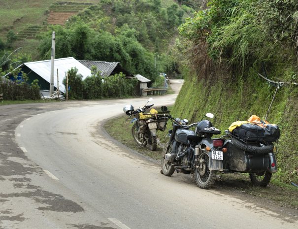 Mu Cang Chai, Yen Bai Province, Vietnam - May 19, 2017: Two motorbikes with many luggage in the car stopped on the road on the pass "O Quy Ho" in Sa Pa in Lao Cai province, Vietnam.


; Shutterstock ID 663244792; purchase_order: -; job: -; client: -; other: -