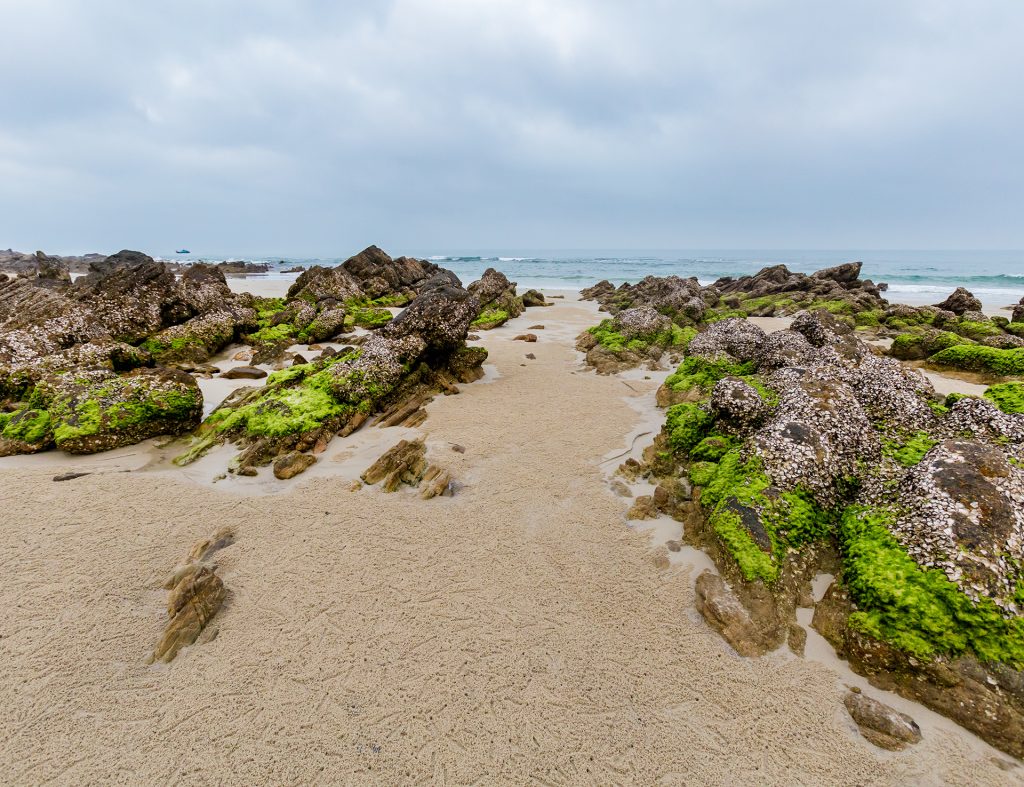 Beautiful landscape of Bai Tam beach, Quan Lan island, Bai Tu Long Bay, Vietnam. Seaside scenery photo taken in south east Asia, Ha Long area.; Shutterstock ID 1939325485; purchase_order: -; job: -; client: -; other: -