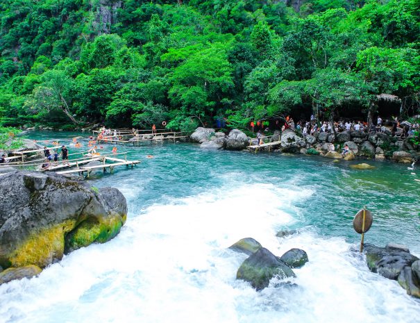 Quang Binh, Vietnam - July 13, 2018: Nuoc Mooc spring - Mooc stream Phong Nha Ke Bang national park; Shutterstock ID 1136598152; purchase_order: -; job: -; client: -; other: -